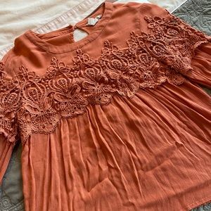 Embroidered accent top!